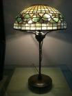 Full view of stone designed antique vintage lamp