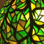 Closeup of green colored antique lamp