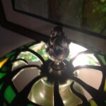 Top view of green colored antique lamp