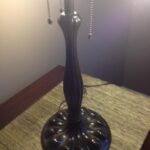 Antique vintage lamp stand on a table