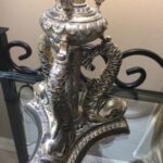 Antique vintage royal lamp stand on a glass table