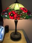 Antique vintage lamp with red colored flower design