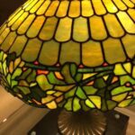 A vintage lamp on glass table